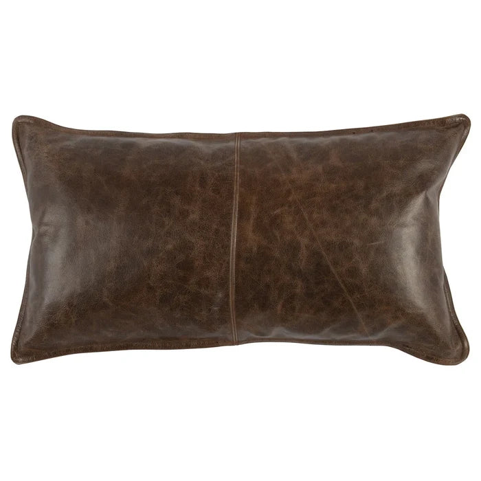 The 14x26 Leather Pillow is rectangular, made from dark brown genuine leather with visible stitching down the center and edges, displayed on a white background.