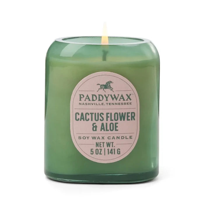 The 5oz Vista Candle features lit green glass and a label with Paddywax Nashville, Tennessee, Cactus Flower & Aloe. Enjoy a luxurious soy wax fragrance in this stylish modern candle. Net Wt. 5 oz / 141 g.