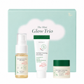 axis-y the mini glow trio skincare gift set featuring travel-size dark spot correcting glow toner, glow serum and glow cream in front of a pastel green gift box. brightening skincare set formulated with niacinamide, squalane and sea buckthorn fruit extract to hydrate skin and help improve the appearance of dark spots and uneven skin tone.