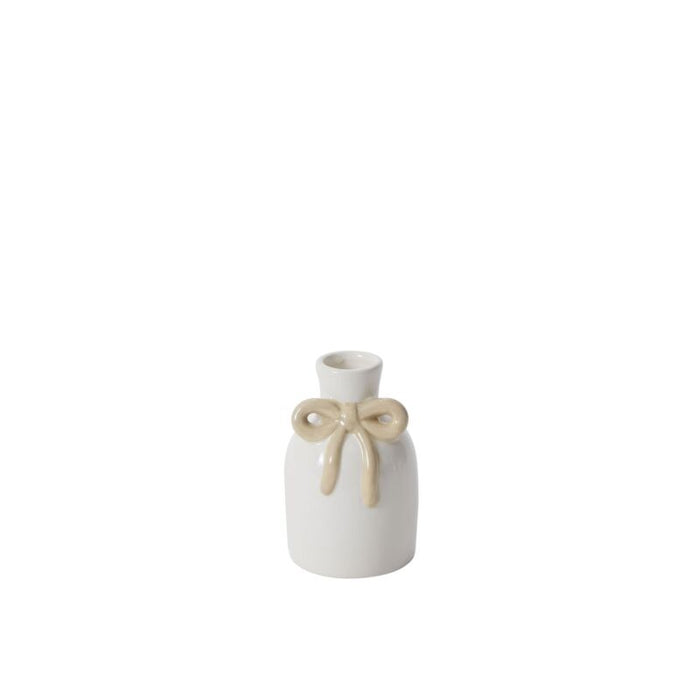 The Budvase w/ Bow is a small white ceramic bud vase featuring a narrow neck and beige bow, ideal for spring event decor, shown against a plain white background.