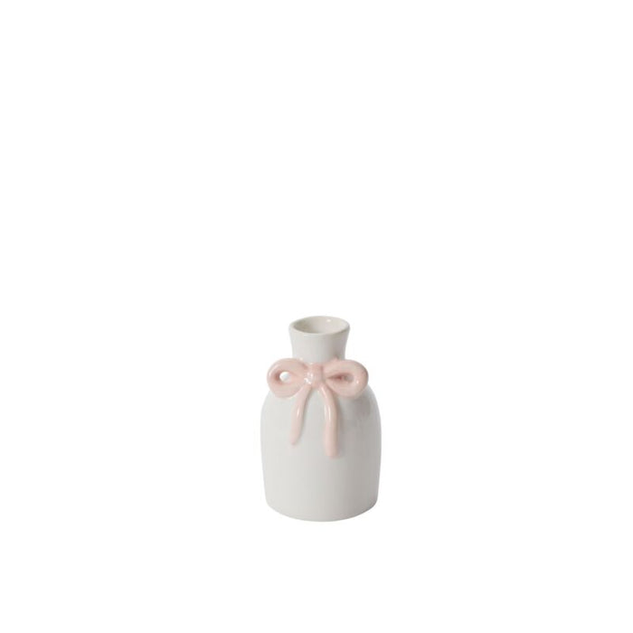 The Budvase w/ Bow is a small white ceramic vase with a narrow neck and a raised light pink bow on the front, ideal for spring event decor and displayed on a plain white background.