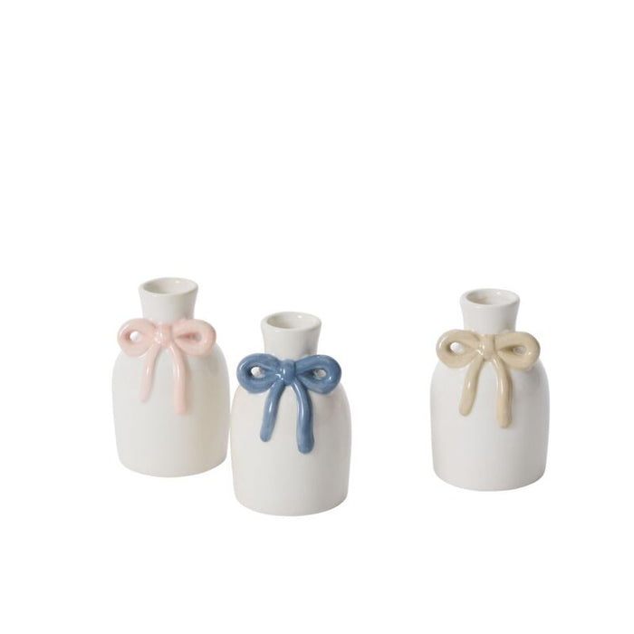 The Budvase w/ Bow is a white ceramic vase featuring a decorative bow, ideal for spring event decor.