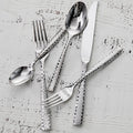 Fortessa 1.5.102.FC.003 Lucca Faceted 8 1/4" 18/10 Stainless Steel Extra Heavy Weight Bouillon Spoon - 12/Pack