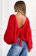 Beginning Boutique Holiday Red Tie Up Knit Cardigan red chunky knit with a deep V-back and tie detail and voluminous sleeves