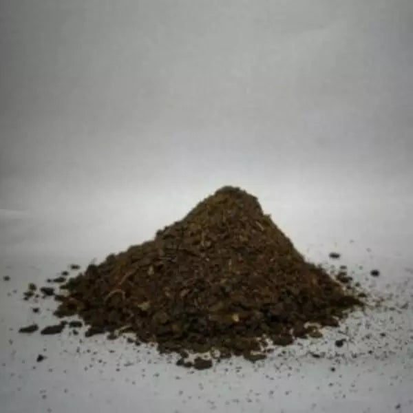 This is an image of the finest Neem Cake Powder for plants kept against white color background.