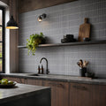 Piano Grey 29.6 x 29.9cm mosaic sheet featuring glossy grey linear mosaic tiles, creating a sleek contemporary finish for kitchens and bathrooms.