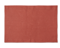 A linen placemat in the color brick