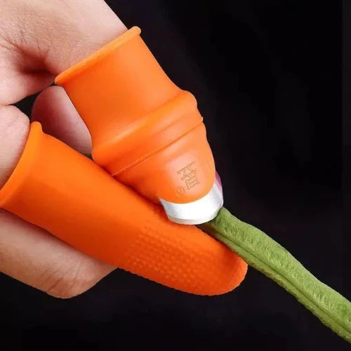 Thumb Knife Cutter cutting a stem.