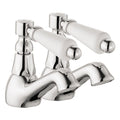 Victoria Bianco chrome bath pillar taps with classic white lever handles, featuring a traditional twin tap design for heritage and period-style bathrooms.