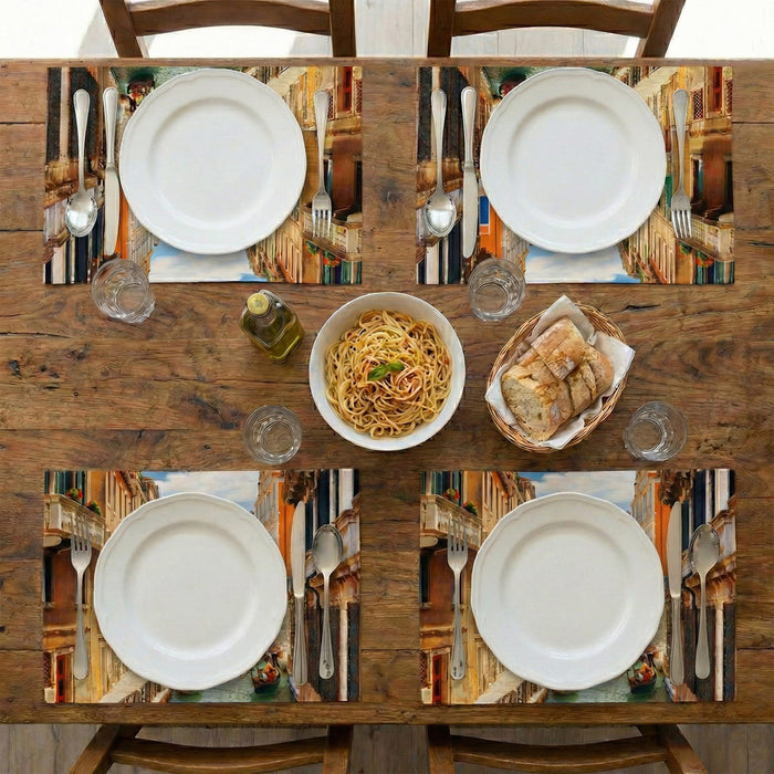 Dining table set with plates, pasta, bread, and cutlery on decorative placemats.