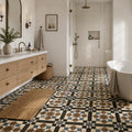 Victoria Multicolour 45 x 45cm patterned porcelain floor tile featuring a geometric design in terracotta, cream, charcoal and muted blue, suitable for stylish interior flooring.